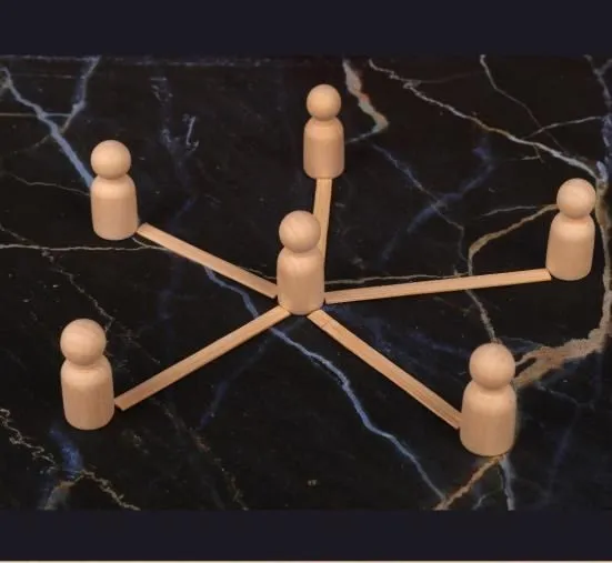 Wooden figures connected to one another by sticks
