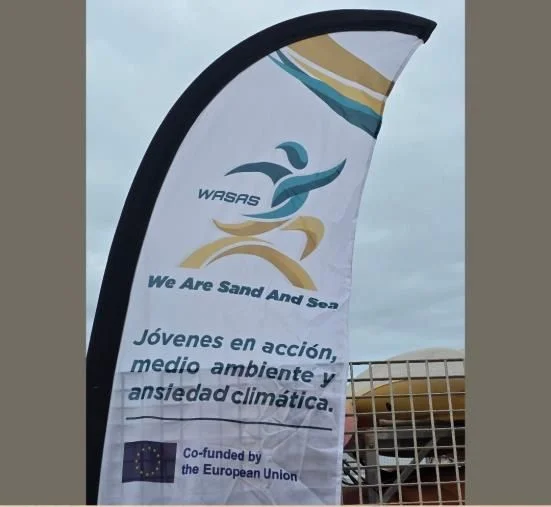 WASAS roll-up banner at an outdoor event, printed with the project slogan on young people, the environment and climate anxiety